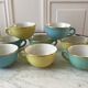 Set of 8 pastel colored cups Digoin Sarreguemines 50s