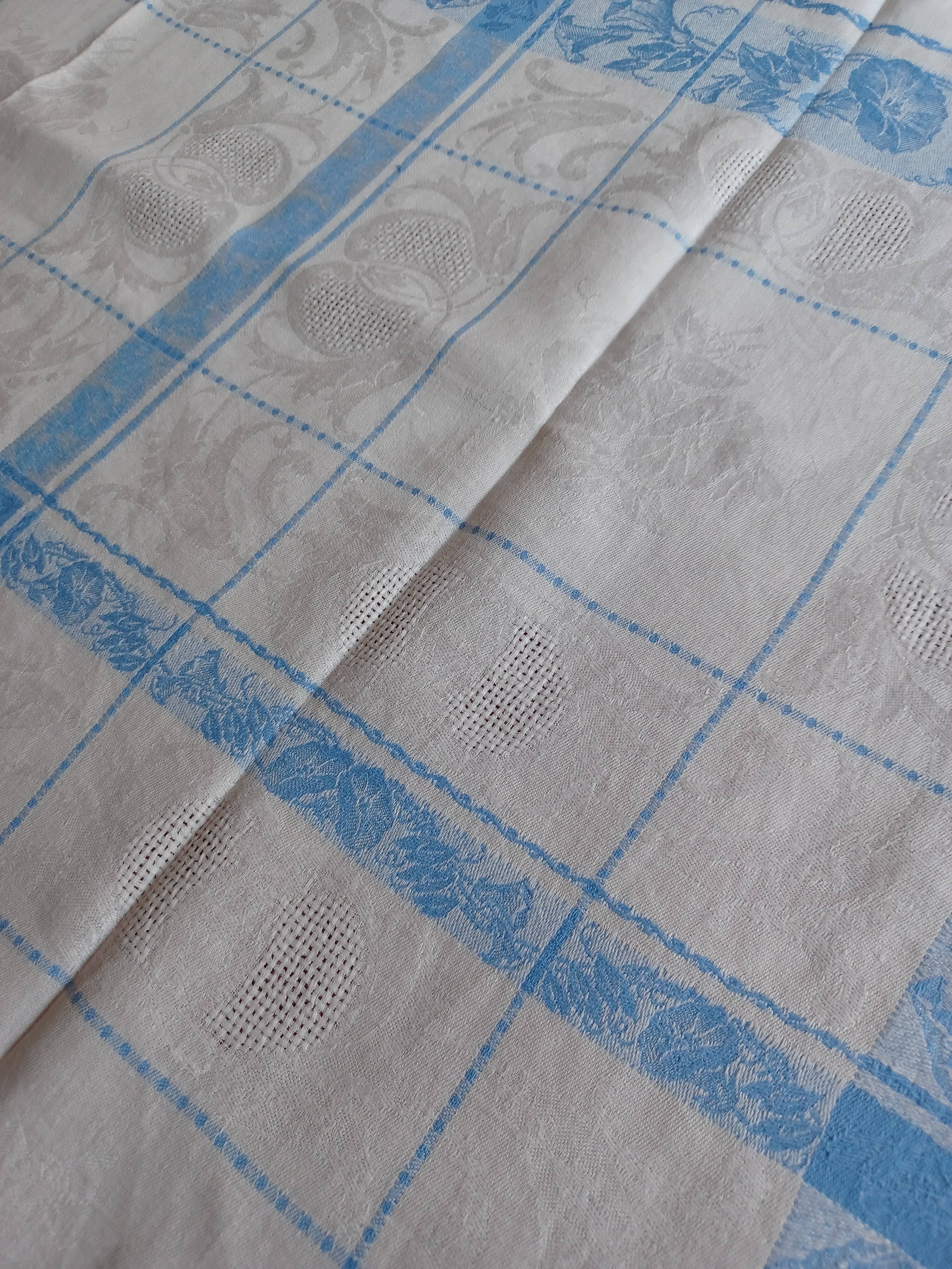 White and sky blue damask tablecloth and 10 towels