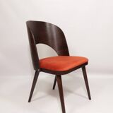Scandinavian design orange papaya shell dining chairs