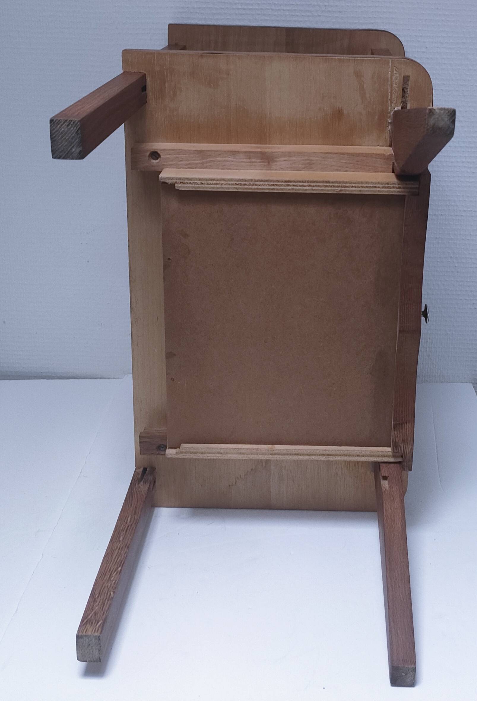 vintage wooden bedside table with crossbars and tapered legs