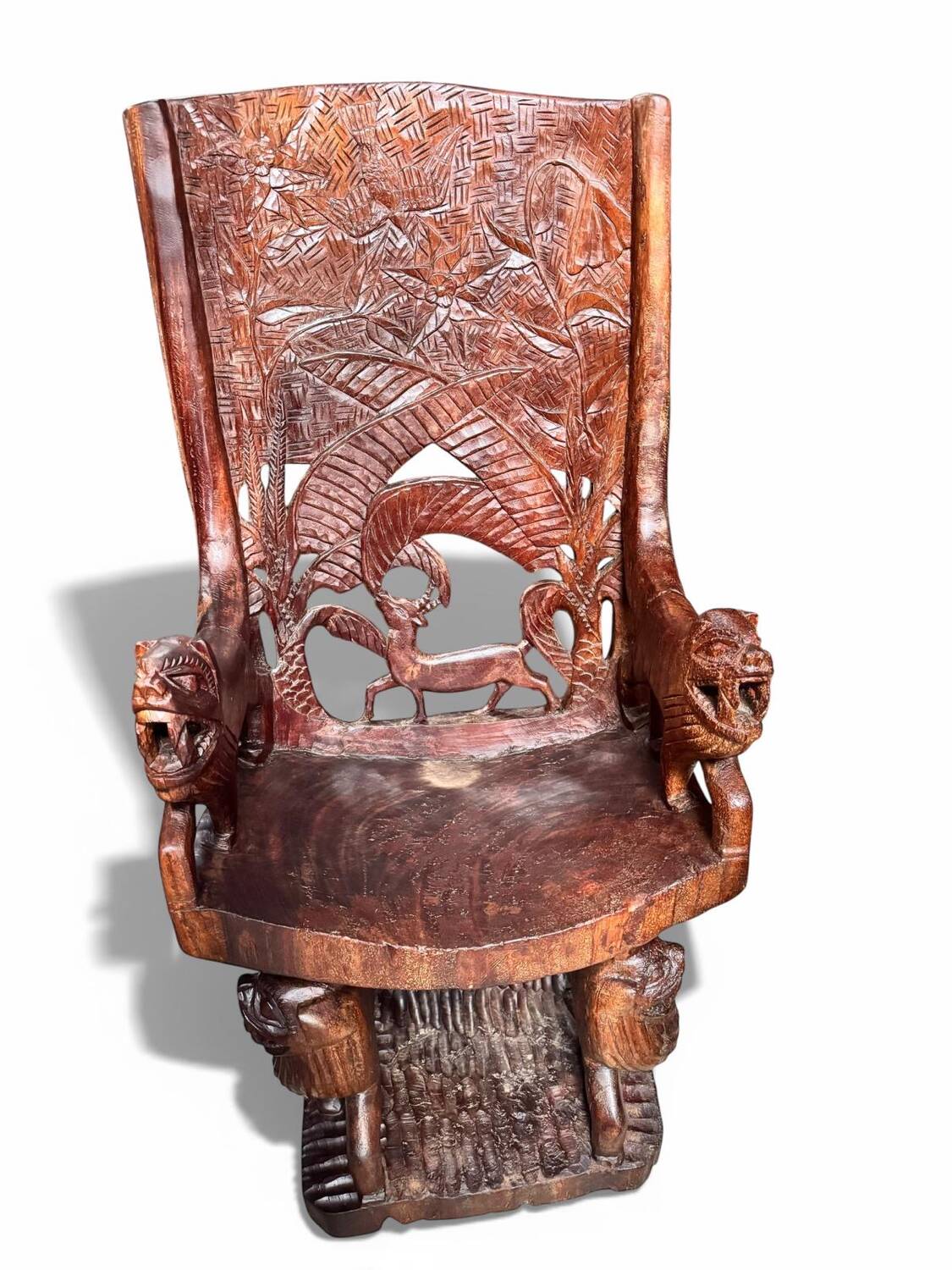 Pair of carved African armchairs