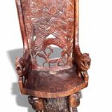 Pair of carved African armchairs