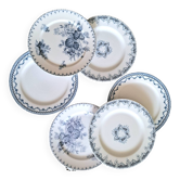 Old mismatched flat plates in iron earth earthenware