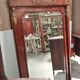 Large Empire-style mahogany mirror – Mercury-gilded bronzes –