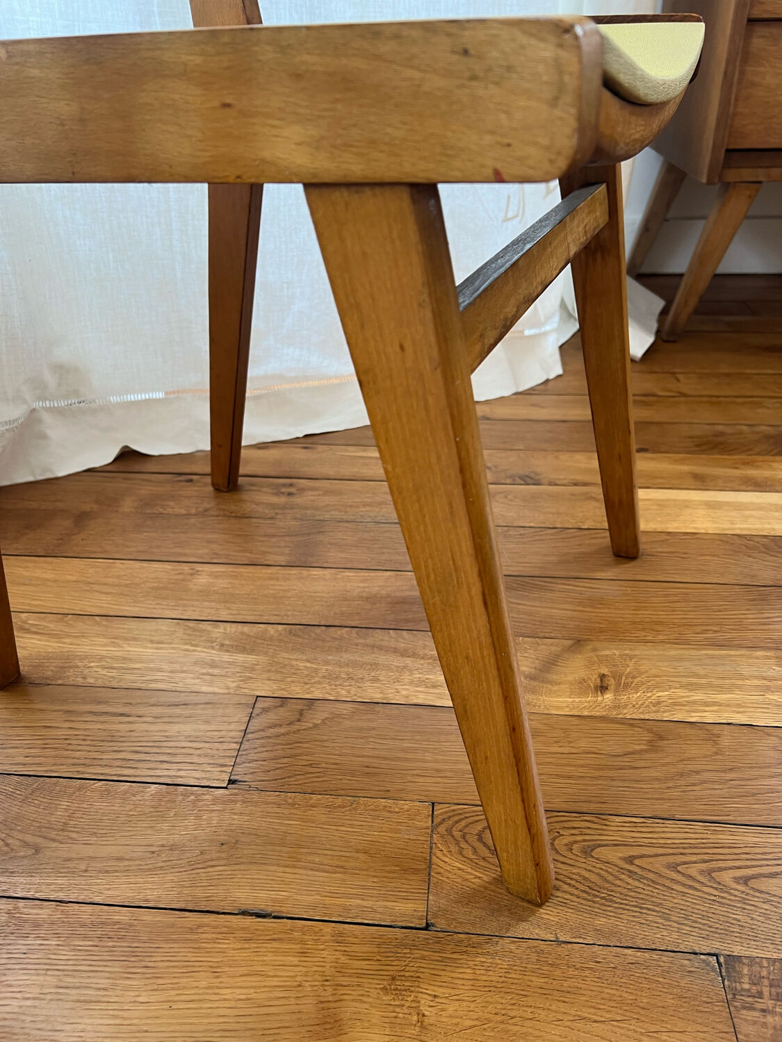 Vintage chairs in wood and skai legs from the 1950s