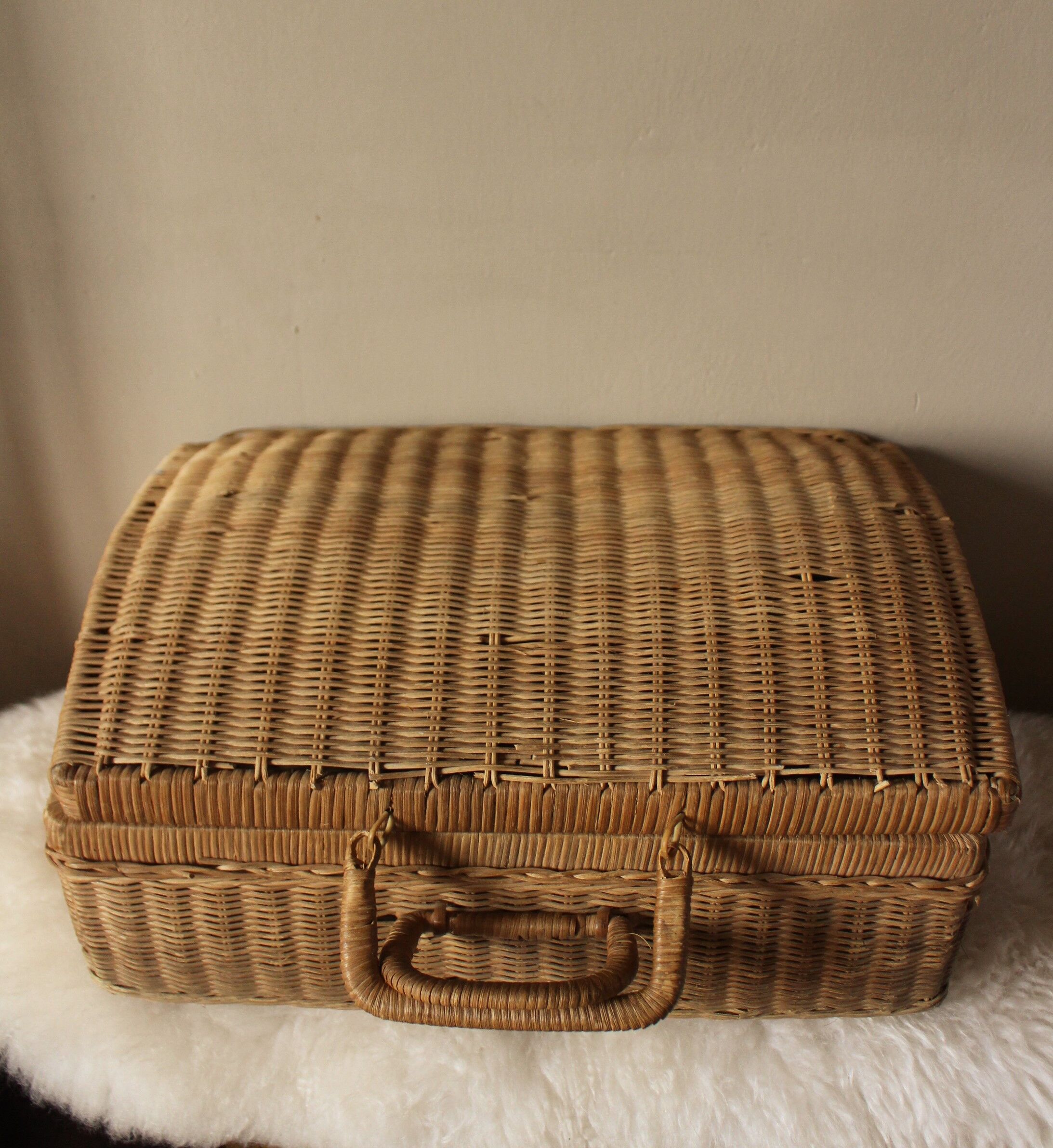 Vintage wicker suitcase