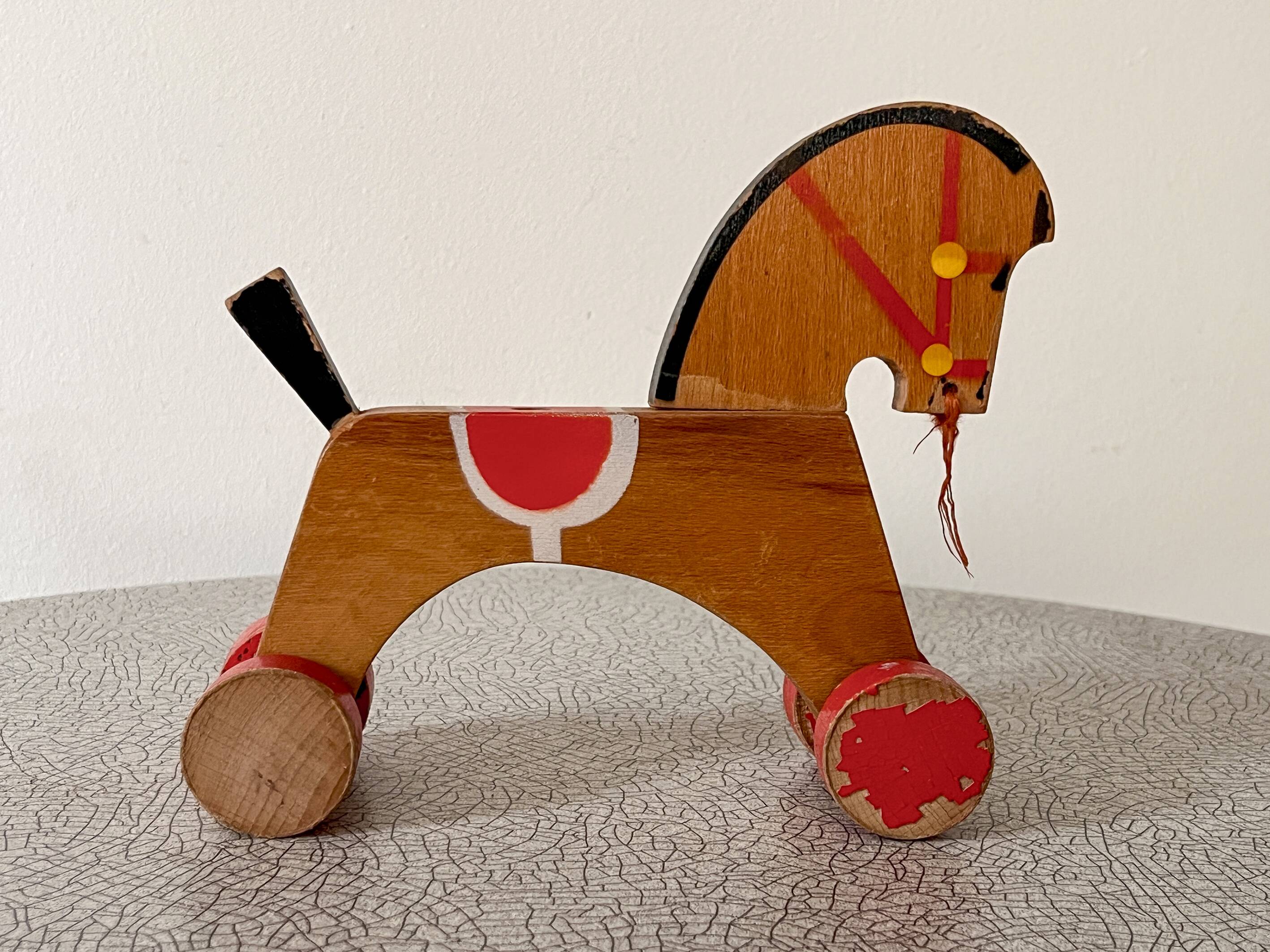 Wooden horse, vintage pull toy.