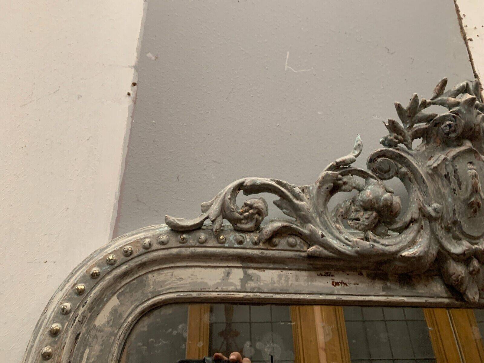 Louis XV style mirror in wood and patinated stucco 19th century
