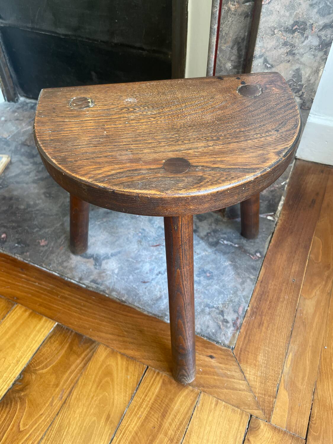 Dark wood tripod stool