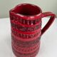 Vintage red ceramic jug