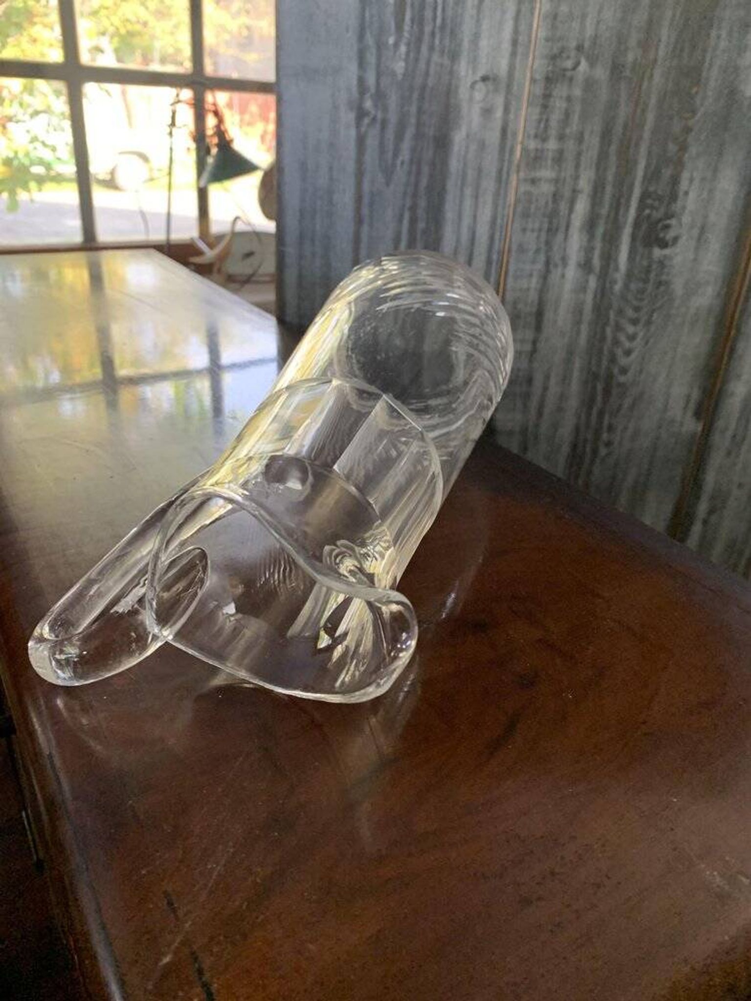 Transparent crystal pitcher, mid-century Hungarian, conical silhouette, sculptural handle and cut decoration.