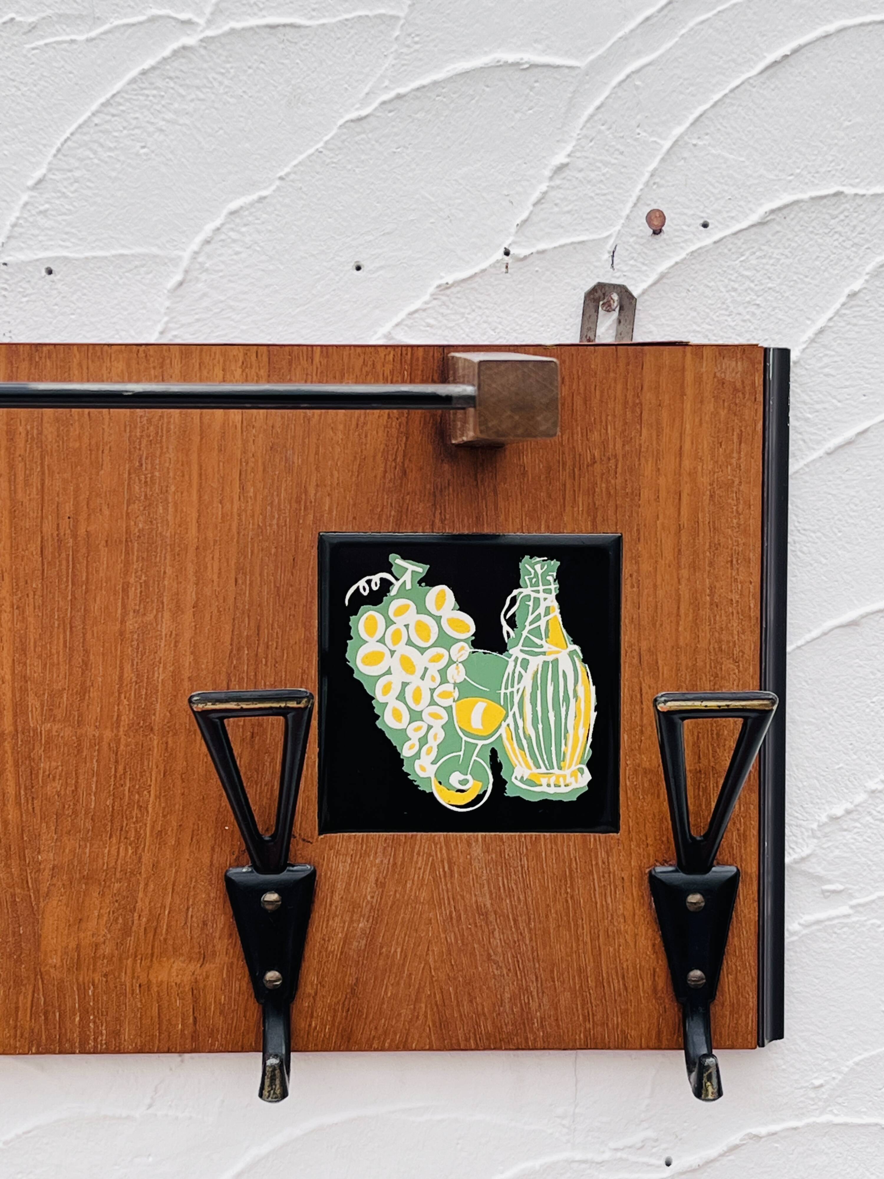 Vintage wooden wall coat rack mirror from the 1960s.