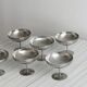 6 shiny metal cups with pearl rim
