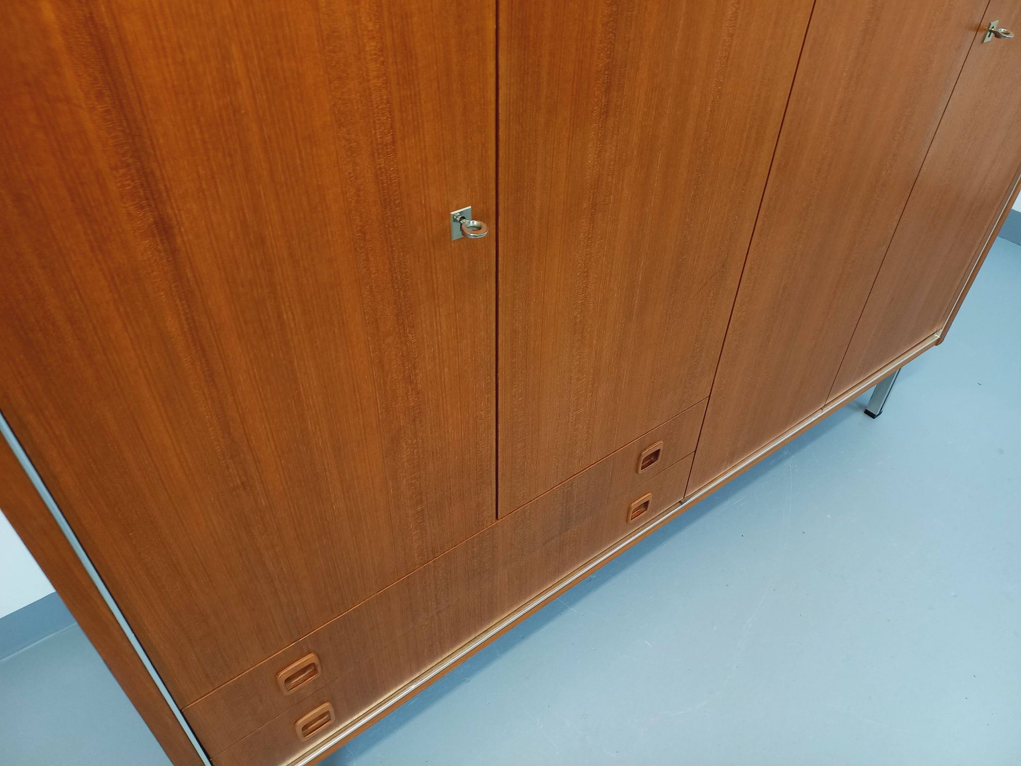 Vintage Scandinavian modernist wardrobe in teak and metal from the 1960s.