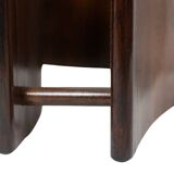 Table basse en palissandre, de forme concave. Années 1970.