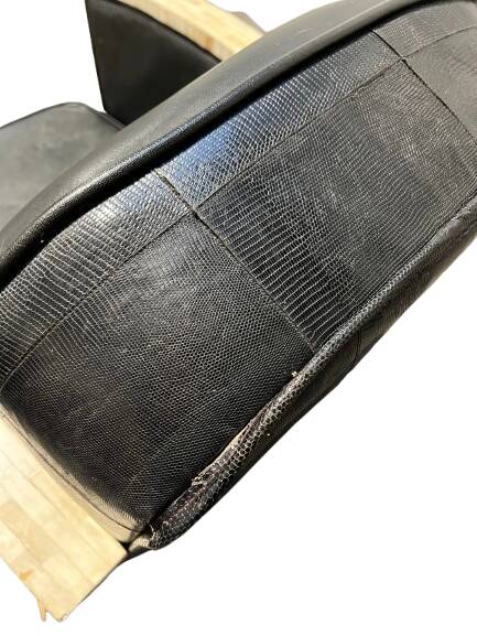 Pair of leather armchairs with marquetry armrests