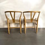 2 teak and rope dining chairs