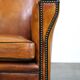 Sleek sheepskin Art Deco design armchair with beautiful details