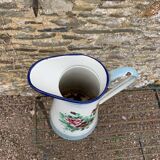 Enamelled broc with floral decoration