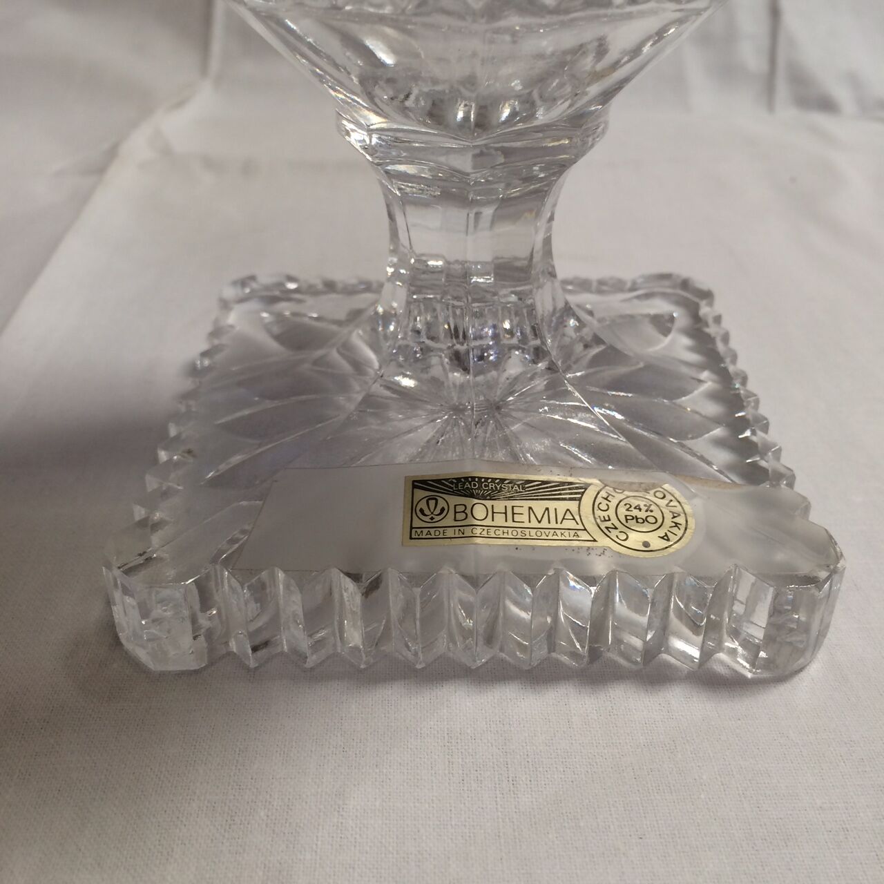 Vase in crystal medici on foot square with label Bohemia