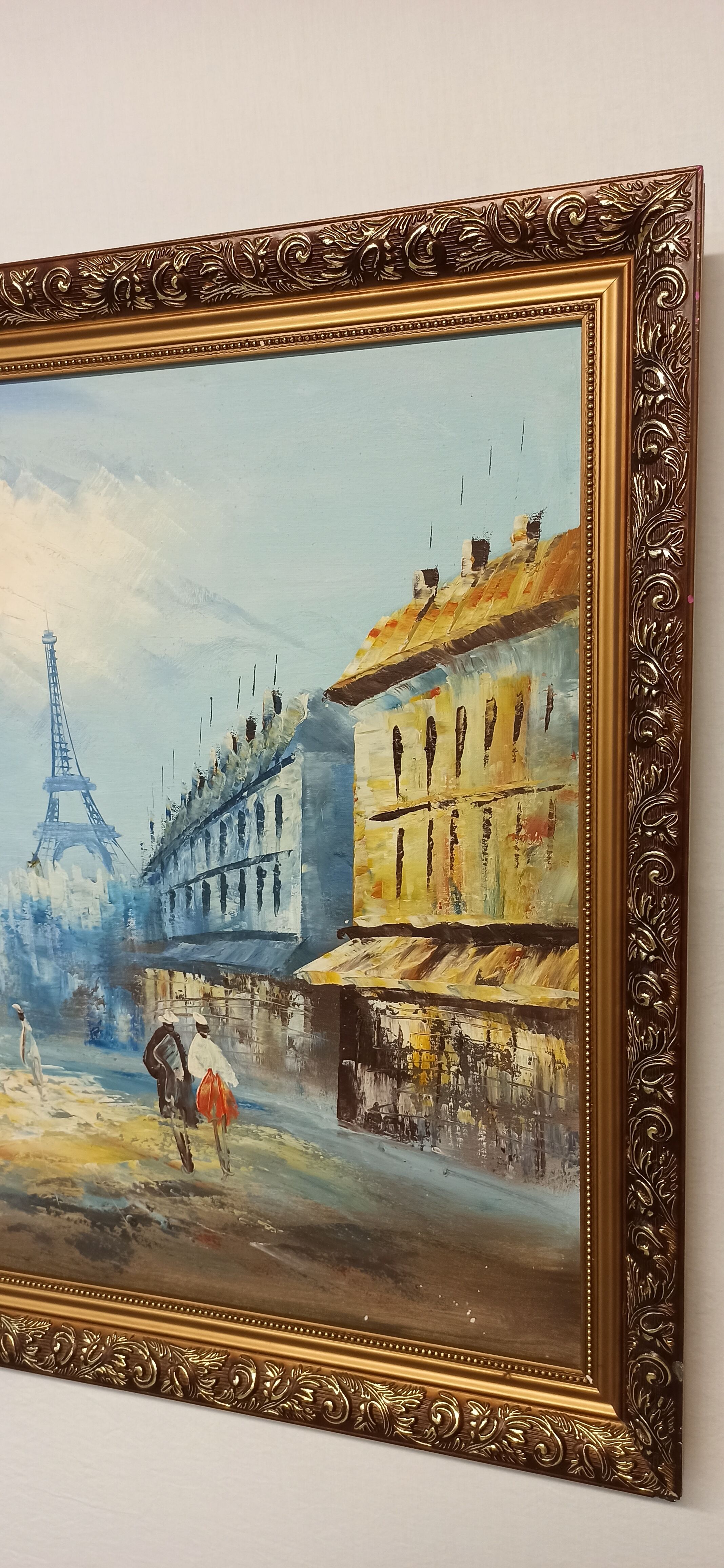 Painting framed by a view of Paris