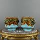 Paire de cache-pots en barbotine à décor de mascarons, XIXe siècle