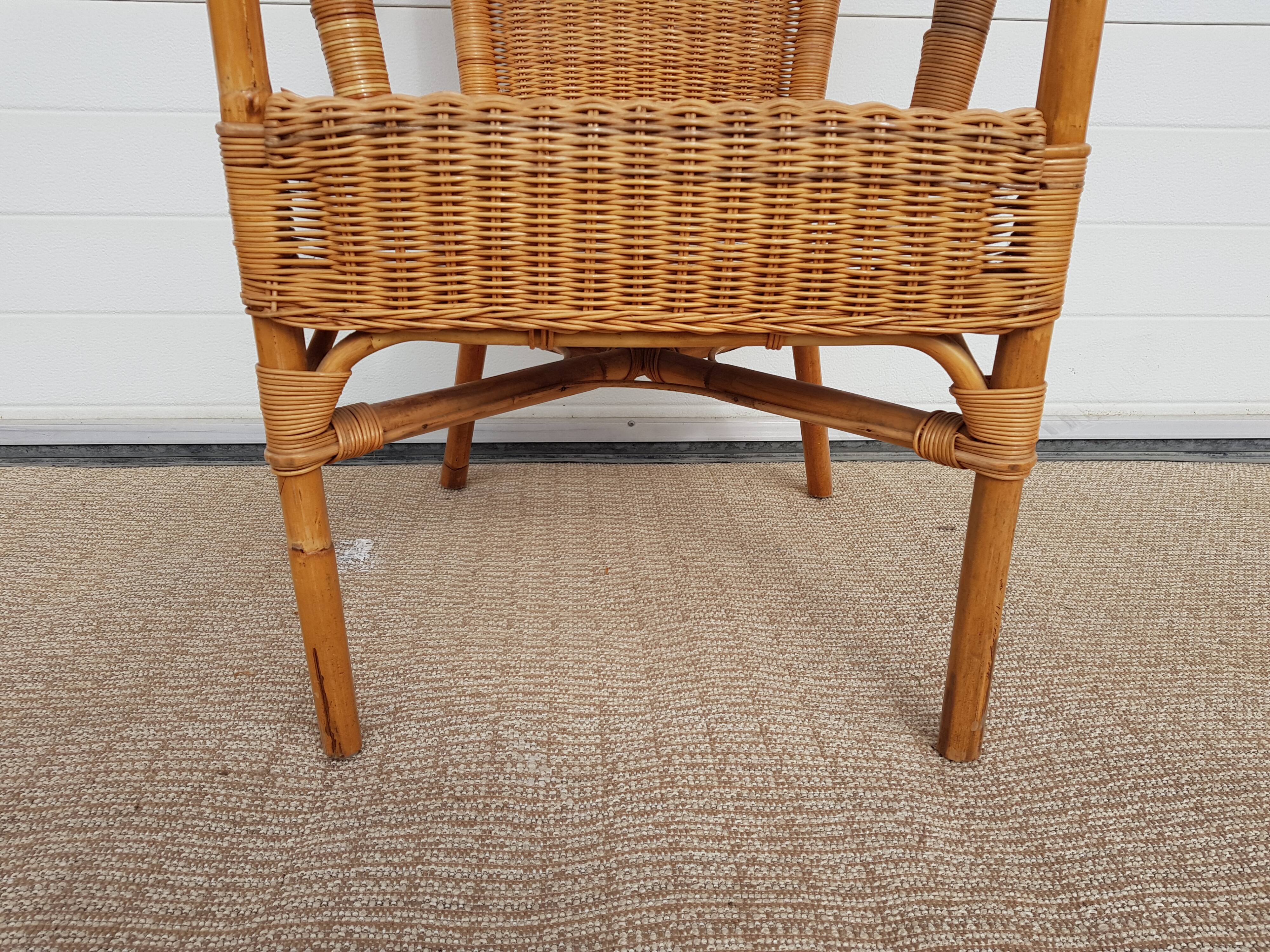 Old chair in bamboo 60s