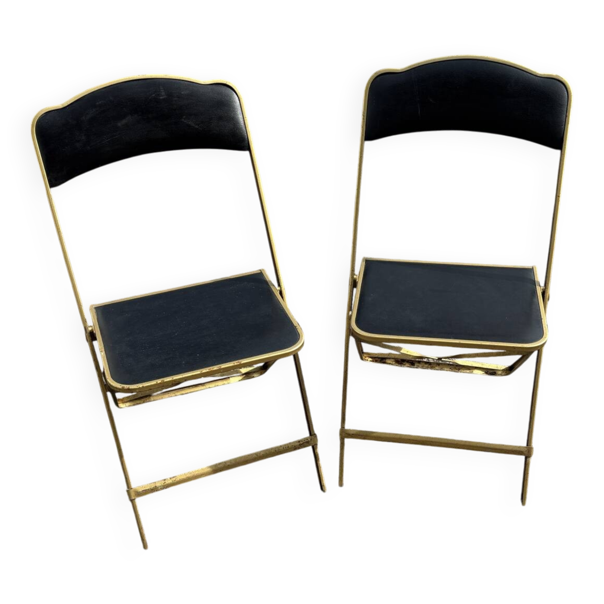 Two chairs, similar black