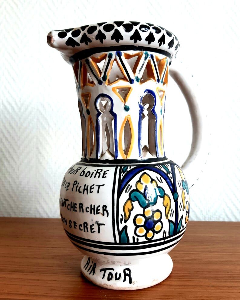 Deceptive pitcher in glazed earthenware