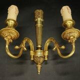 Pair of Louis XVI style quiver sconces in gilded bronze