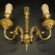 Pair of wall sconces in the Louis XVI quiver style in gilded bronze.