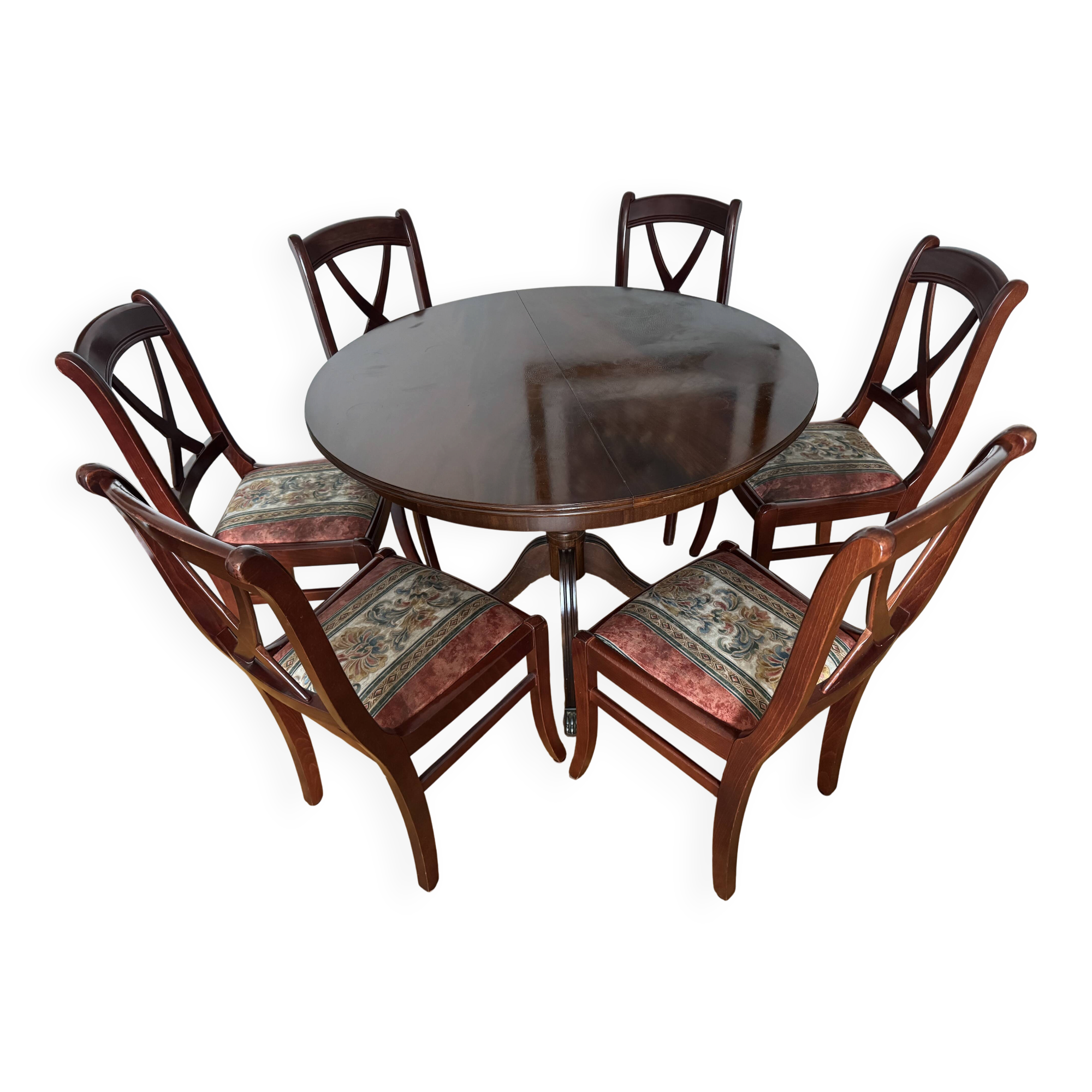 Round mahogany table and beech chairs.