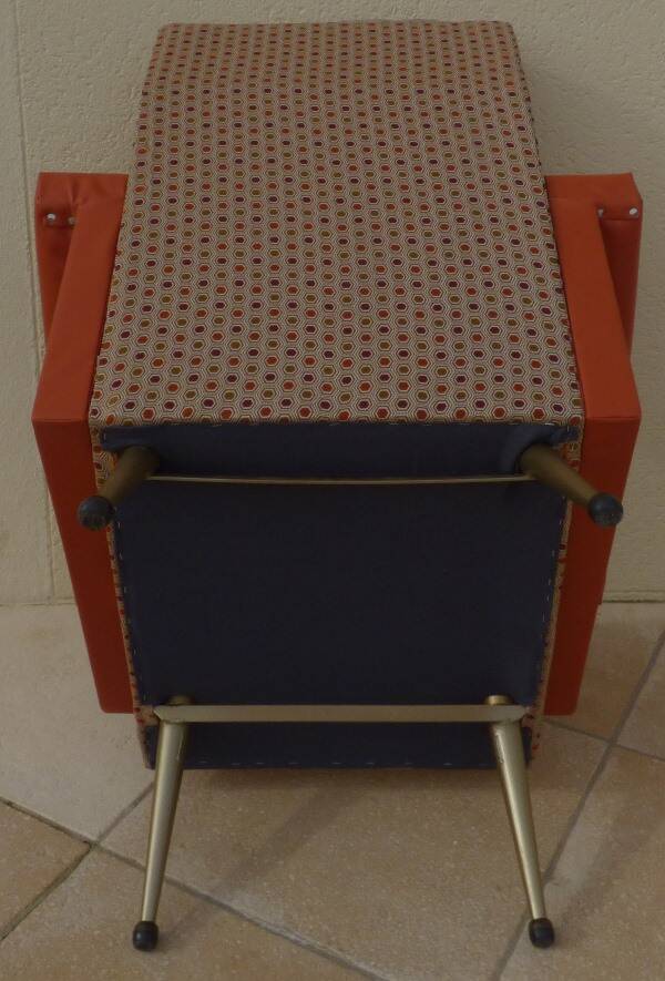 Retro vintage rockabilly armchair in orange faux leather and vintage fabrics