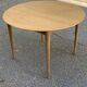 Table à manger scandinave ronde extensible décapée en teck brut 1950