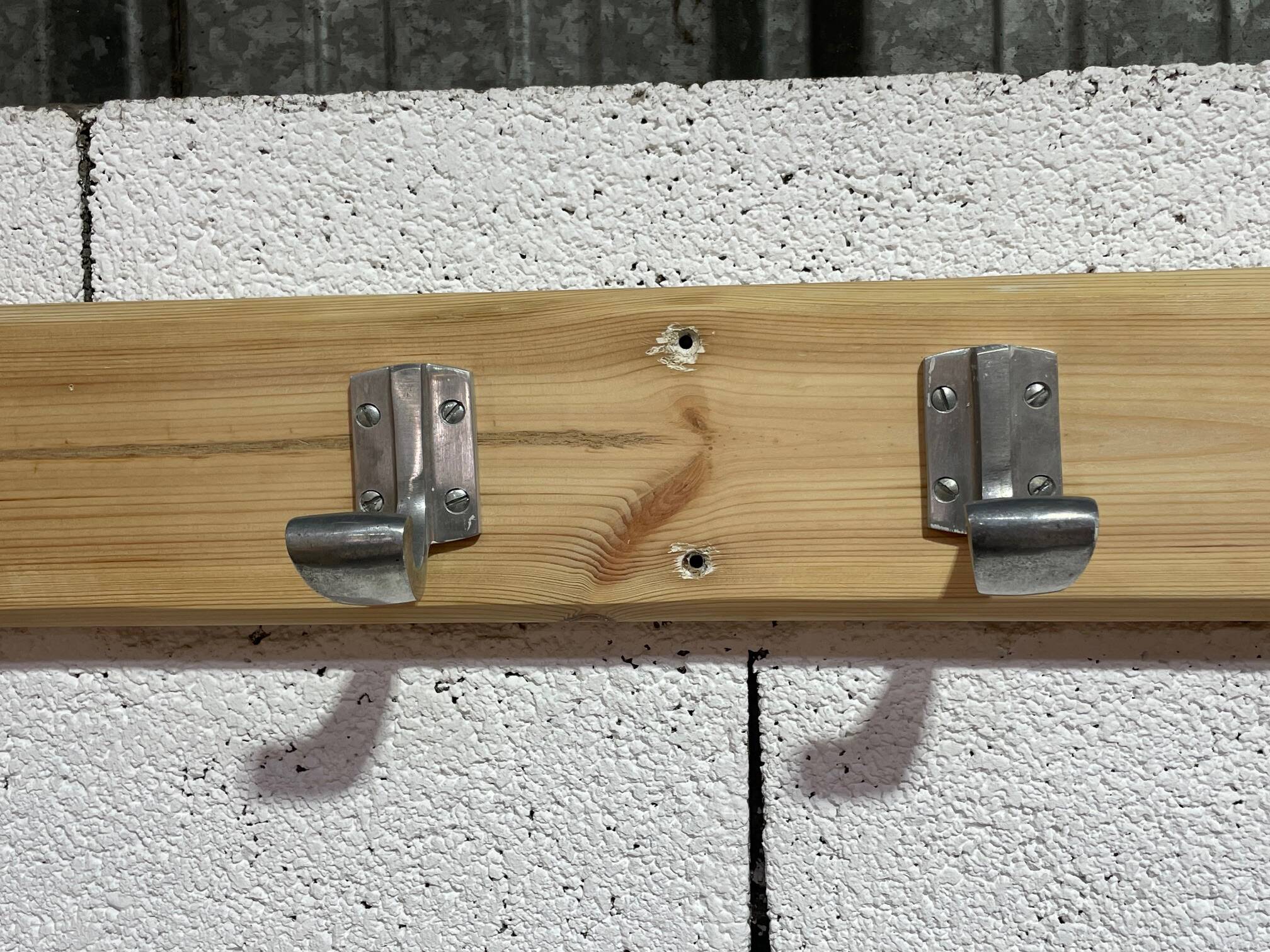 Vintage wall coat rack from the 1960s.