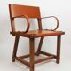 Leather armchair by Jacques Adnet