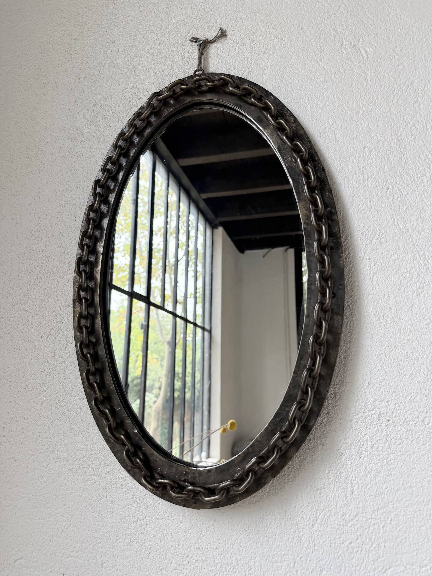Miroir brutaliste ovale « chaine » 1950