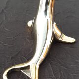 Silver and gold metal sea lion bottle opener