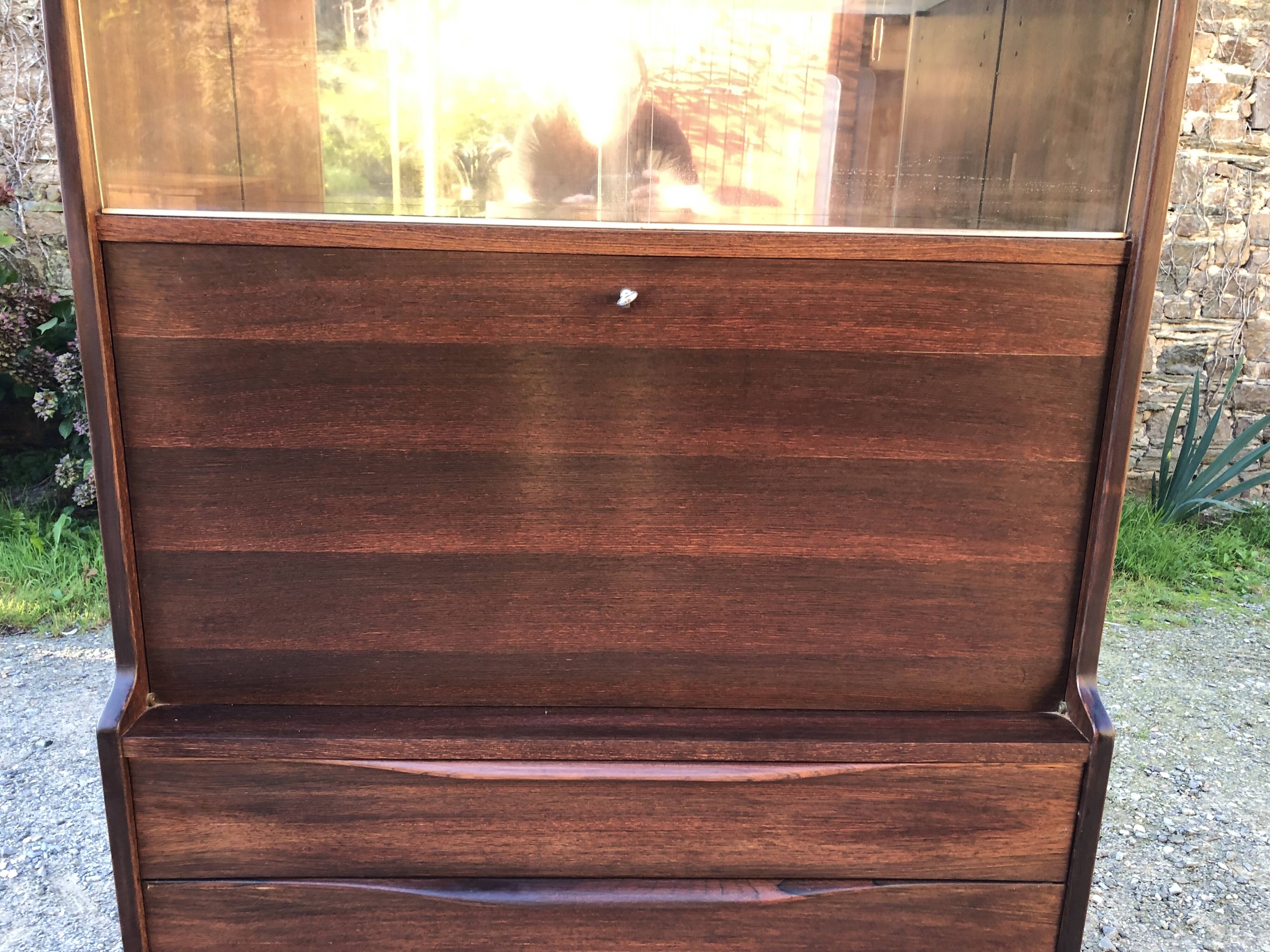 Vintage Scandinavian secretary in rosewood with drawers featuring fin-style handles.