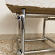 Coffee table in chromed rod