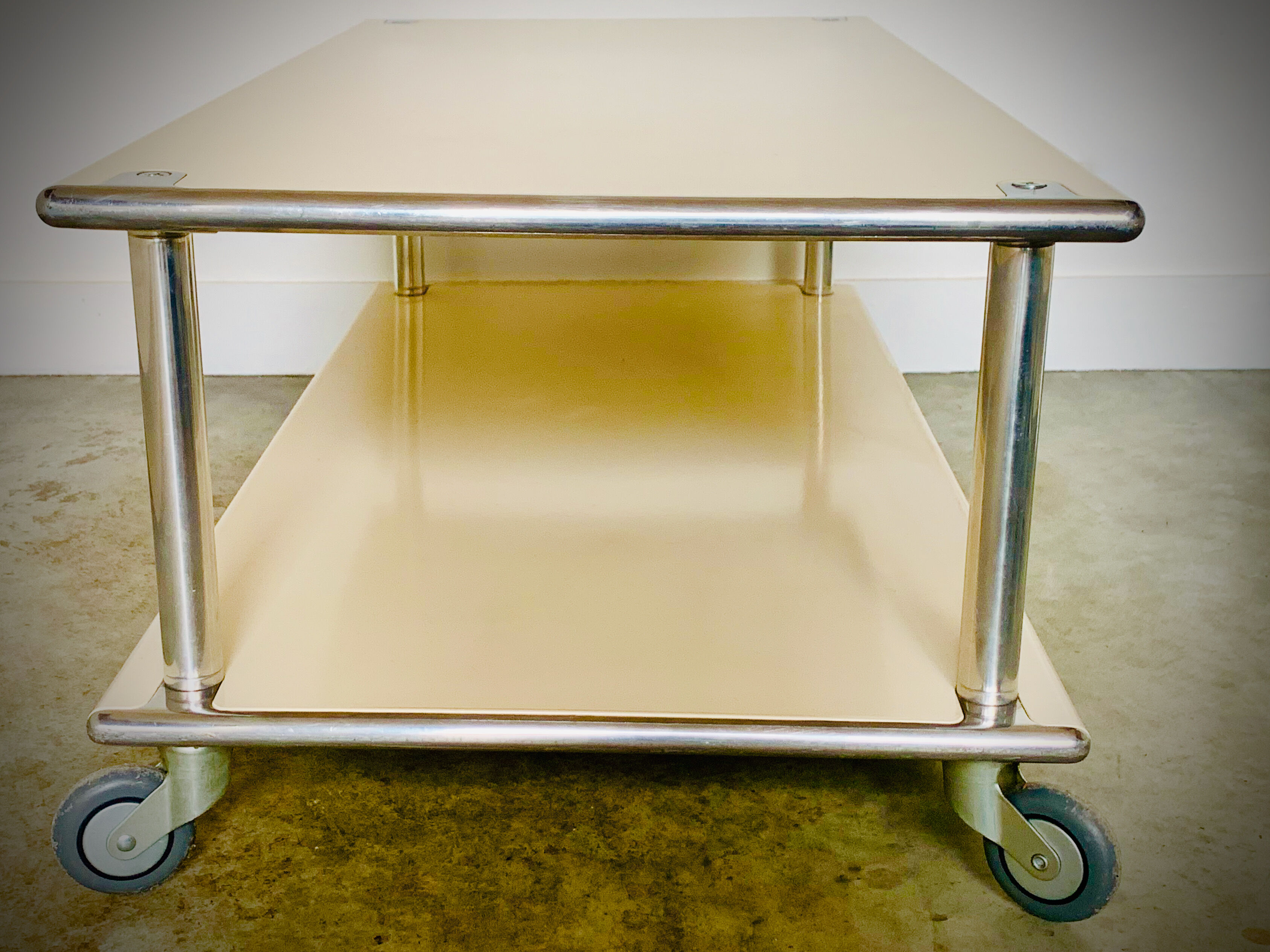 Modernist coffee table - airplane wing - in lase plate and brushed aluminium