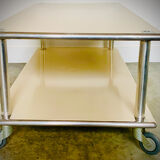 Table basse moderniste - aile d'avion- en tôle laquée et aluminium brossé