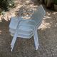 Perforated metal armchairs
