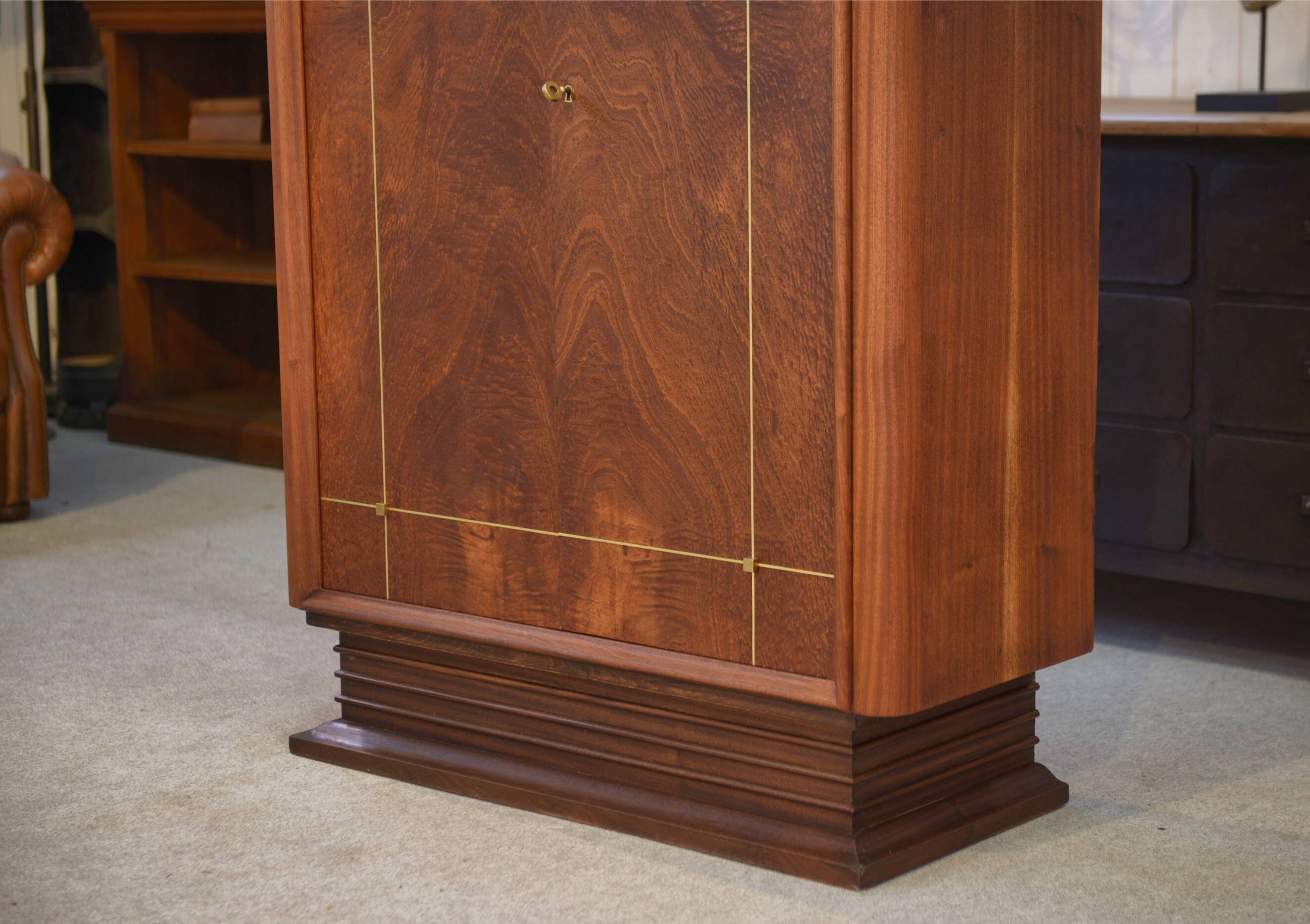 Art Deco mahogany wardrobe, signed A. Bicchierini, 1940s.