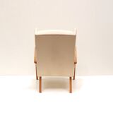Danish design vintage armchair with cream upholstery from the 70s