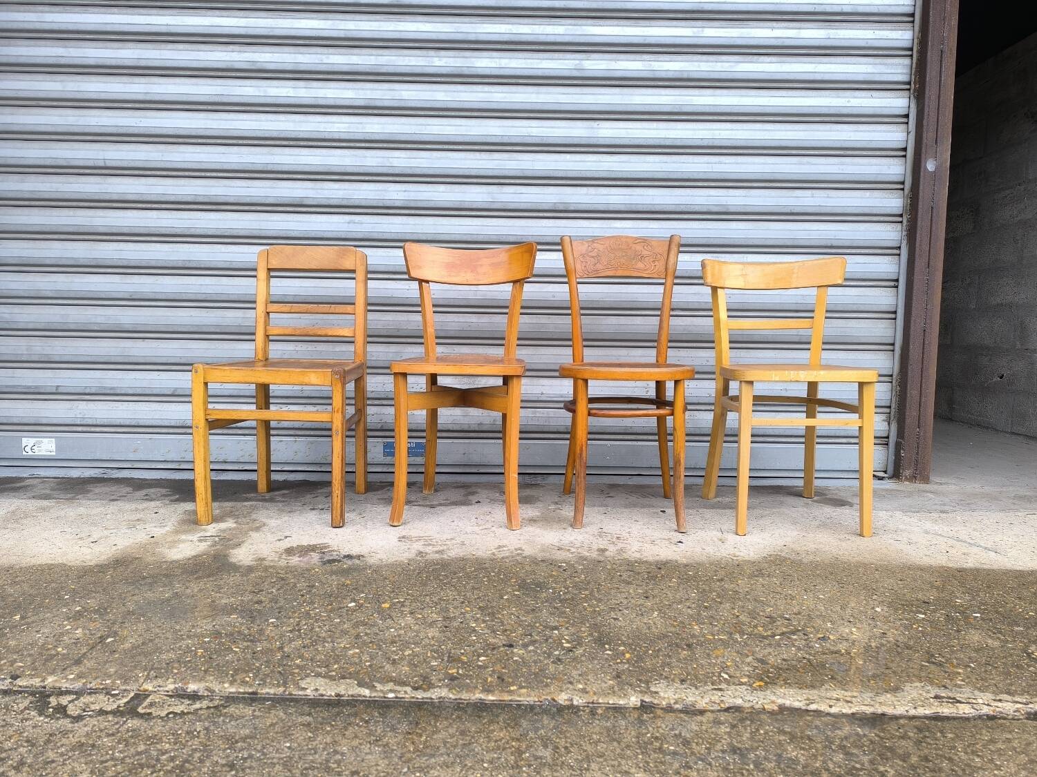 Set of four mismatched bistro chairs