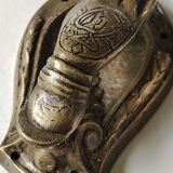 Door knocker in bronze