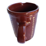 Enamelled clay pitcher