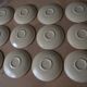 11 St Amand glazed stoneware cups and saucers/sugar bowl/milk jug