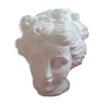 White plaster statue: man's head.